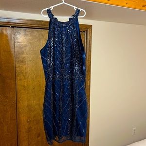 Brand-new with tags, evening mini-dress with sequin details. Never worn